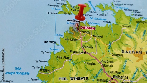 View of Darwin, is the capital city of the Northern Territory, Australia, on a geographical map of Australia and New Zealand, marked with red pushpin
