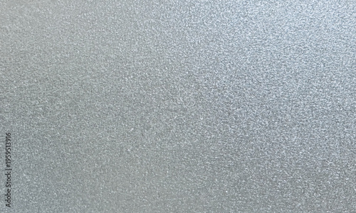 繊細に輝くシルバーグリッターのテクスチャ背景。上品なラメの質感