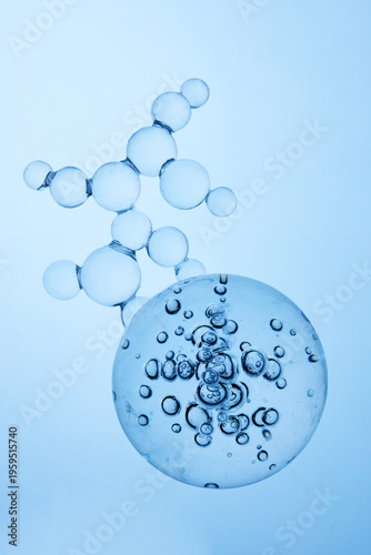 Abstract cosmetic lab. Blue molecule structure and bubbles in clear liquid