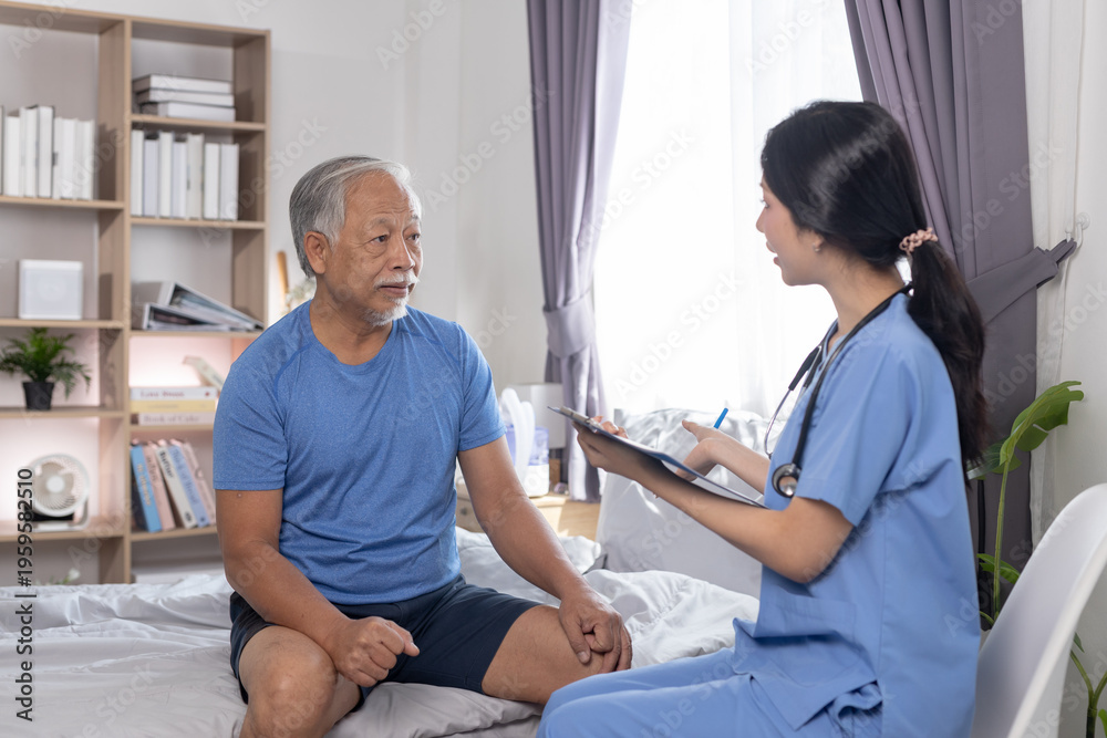 Obraz premium Senior man discussing health concerns with Nurse professional caregiver during home consultation. Concept of elderly care, medical advice, trust, support, Health checkup.