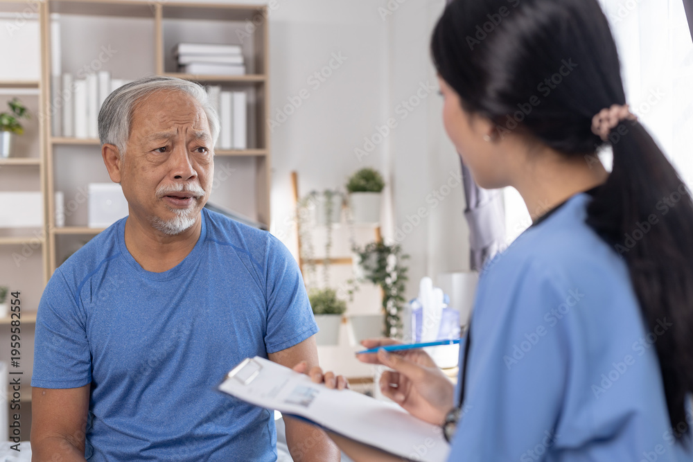 Obraz premium Senior man discussing health concerns with Nurse professional caregiver during home consultation. Concept of elderly care, medical advice, trust, support, Health checkup.