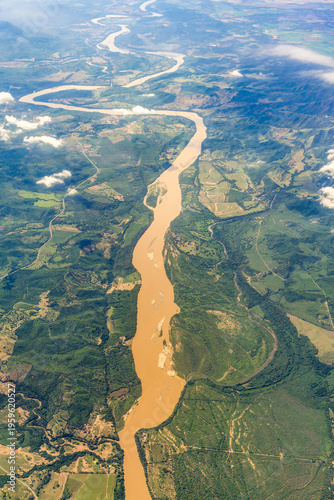 Meandering Magdalena River Aerial View in Colombia South America Featuring Sediment Rich Water and Tropical Alluvial Plain Topography