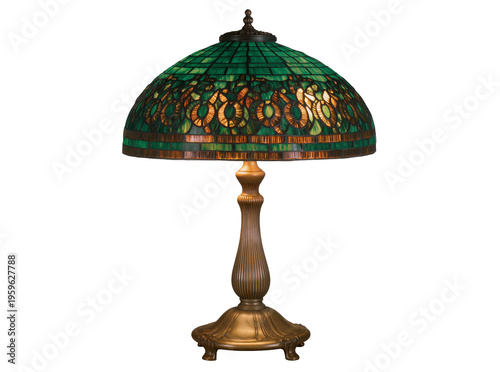 Foto Elegant Tiffany style table lamp with intricate green stained glass shade and or