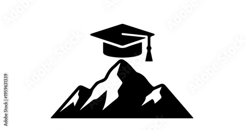 Graduation cap symbolizing achievement on mountain peak