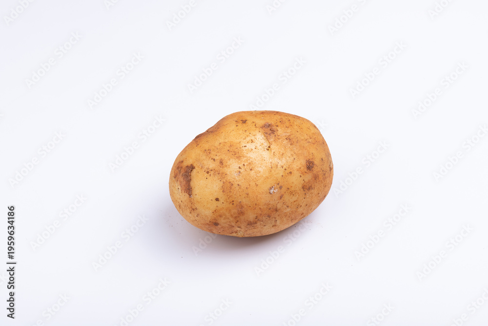 Fototapeta premium Fresh potatoes on a white background