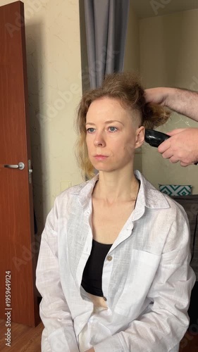 Brave Young Adult Woman Facing Chemotherapy Hair Loss With Support at Home