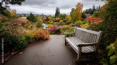 Serene Garden Pathway with Wooden Bench in Autumn Colors