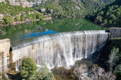 Aerial view of Margalef dam on sunny winter day. Tarragona Province, Spain.