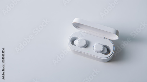Wireless earbuds charging case on minimalist white background