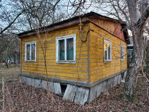 Obraz na płótnie Old abandoned wooden house. Dilapidated house in countryside