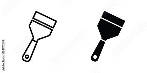 Two different types of putty knives used for construction and finishing tasks