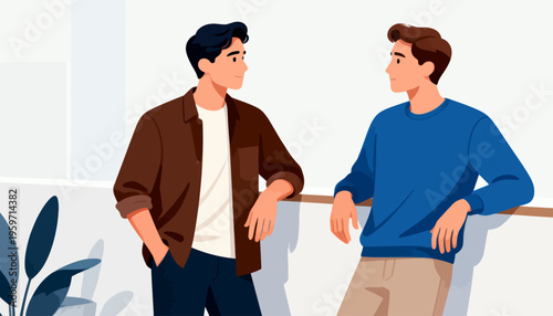 Two men chat near a window ledge. One wears a brown jacket and white tee. The other sports a blue sweater and beige pants. They lean casually, facing each other