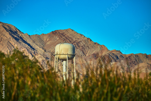 Water Tower and Mountain Landscape with Wetlands Vegetation in Nevada