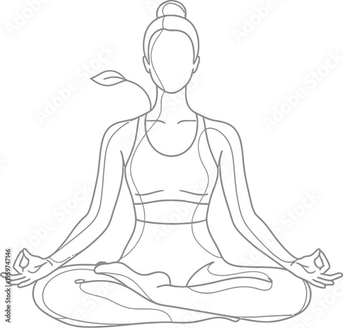 Woman sitting in lotus position wearing yoga outfit and meditating peacefully
