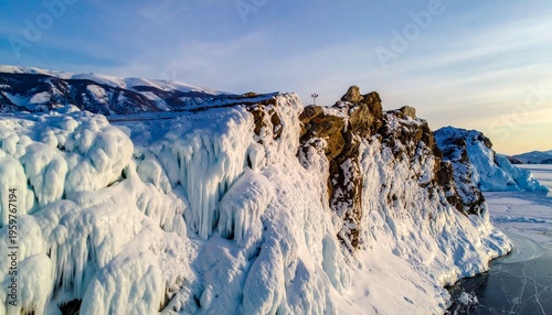 Frozen Rocky Cliffside with Snowy Landscape.