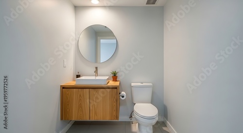Modern Bathroom with Wooden Vanity and Round Mirror