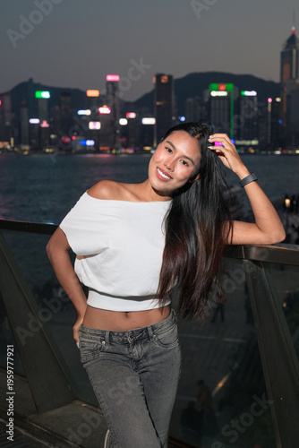 Thai Woman Tourist at Hong Kong Night Skyline