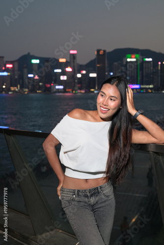 Thai Woman Tourist at Hong Kong Night Skyline