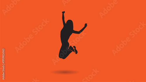 Silhouette of a young woman jumping high with happiness and success isolated on an orange background for motivation energy and freedom design concept with dynamic pose and shadow