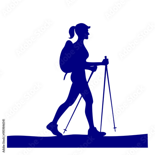 A woman hikes with trekking poles on a trail wearing a backpack