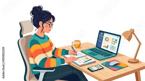 Young woman working diligently at her desk with laptop.