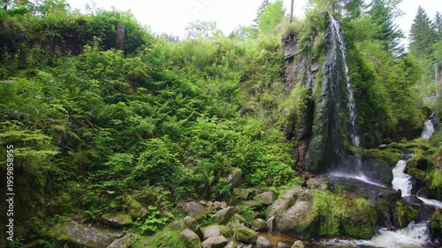 Looking up at Waterfall in Menzenschwander cascade in Black Forest Germany Schwarzwald