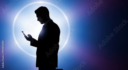 Silhouette of businessman using smartphone against glowing moon and starry night sky