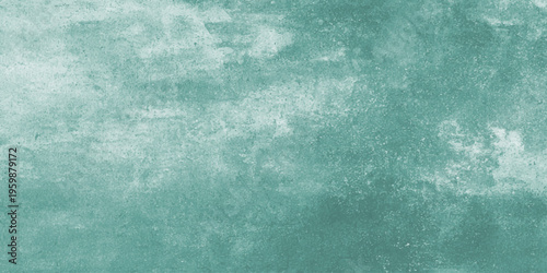 A vintage blue grunge abstract background features a light textured paint pattern on an aged rough paper surface for a retro art backdrop design