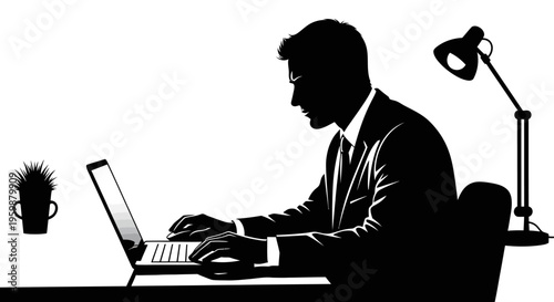 Silhouette of businessman working on laptop at desk with desk lamp and plant