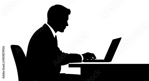 Silhouette of businessman working on laptop at desk, focused on screen, office setting