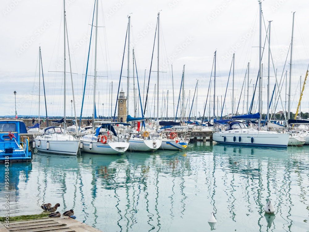 Fototapeta premium Garda lake, Italy. Lighthouse in the port of Desenzano del Garda.