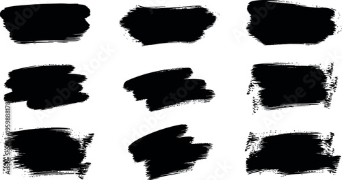 A collection of nine black ink brush strokes on a white background