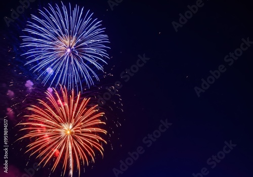 Vibrant fireworks exploding in night sky