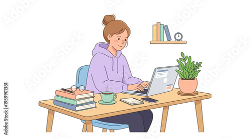 Young woman working diligently on her laptop at a desk.