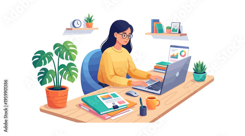 Young woman working diligently on her laptop at a desk.