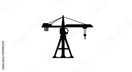 Industrial tower crane depicted in a stark black silhouette