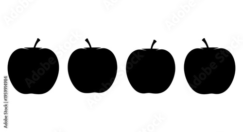 Four dark apples arranged in a row a striking silhouette