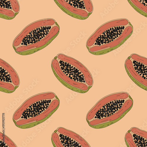 papaya halves with seeds on peach background