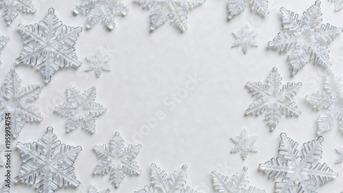 Snowflakes gently adorn a calm snowy background