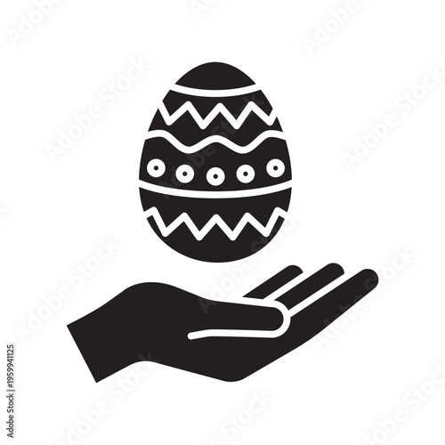 A black solid vector icon depicting a decorated Easter egg with zigzag and wave patterns floating above an open palm. Simple minimal folk style design isolated on white.