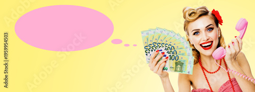 Expressive happy smile pin-up blond woman girl shows points money euro cash banknotes fan, holds phone. Isolated yellow background. Pink think speech bubble speechbubble, cloud ballon, thought float