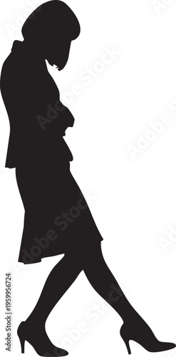 Silhouette of a pregnant woman in a dress and high heels standing sideways