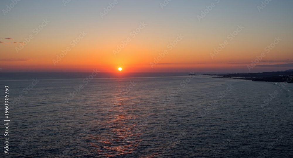 Obraz premium Picturesque summer sunset backdrop over Portugal ocean waters