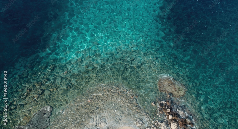 Fototapeta premium Expansive aerial image of a peaceful oceanic landscape