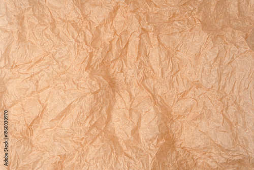 Crumpled paper as background. Top view.