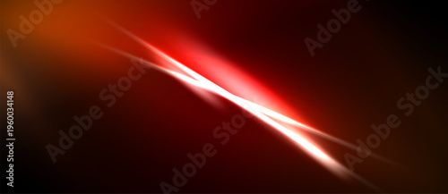 Abstract red energy streaks across dark background. Bright light creates dynamic visual effect, suggesting speed, power.