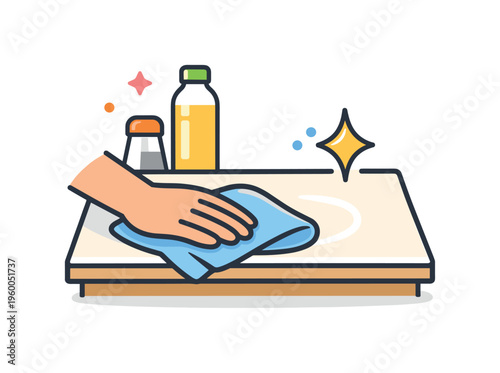 Wiping a kitchen surface after cooking as part of regular household routine focused on cleanliness and maintaining a tidy environment, a simple cloth with a table and a small
