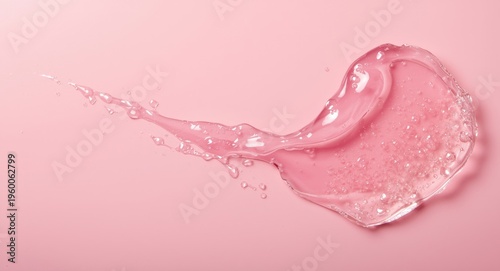 Skincare hydration background showing pink gel serum with bubbles