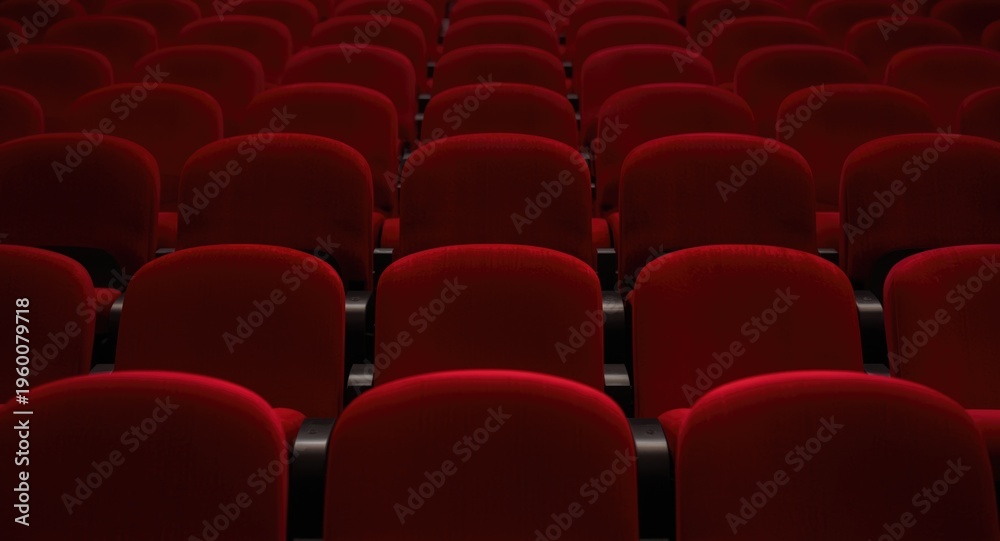 Fototapeta premium Empty red theater chair with ample copy space in background