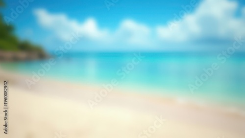 blurred tropical beach background with sand ocean and blue sky summer vacation concept